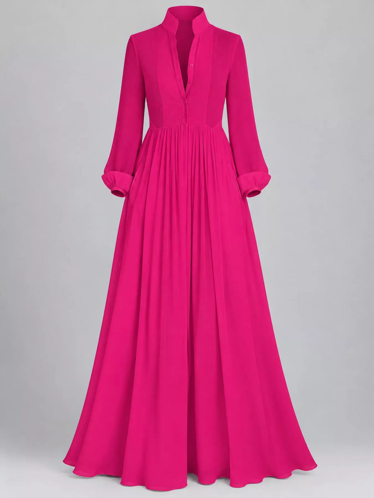 A bright fuchsia pink long-sleeve maxi dress with a high mock neck, split V-neckline, and a pleated skirt, shown on a neutral gray background.