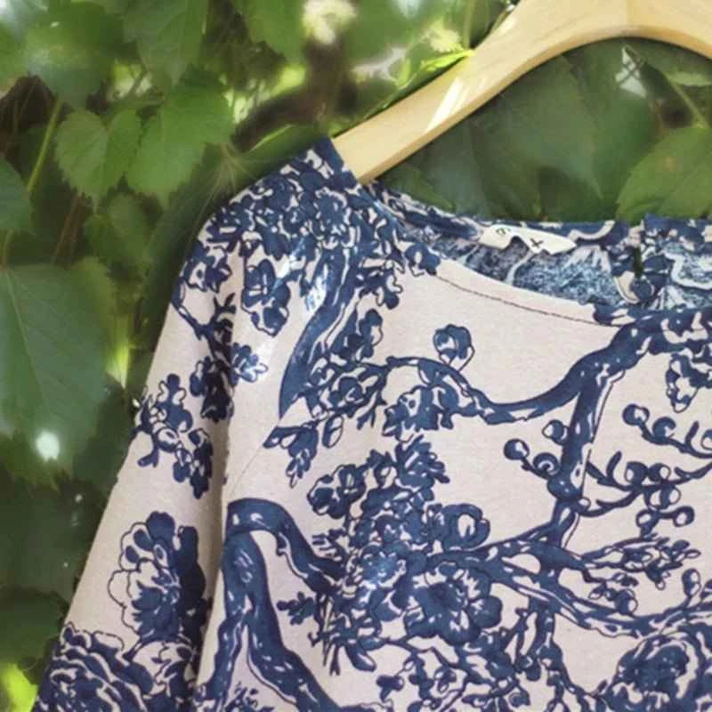 Elara floral linen midi dress with relaxed fit and vintage print