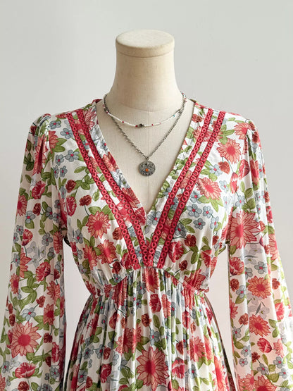 Floral dress on a mannequin with a plain background