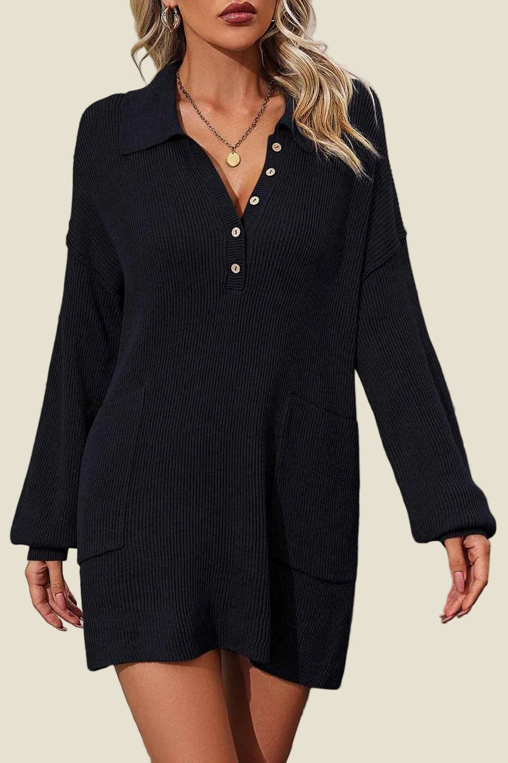 Black ribbed sweater dress worn by a model on a beige background