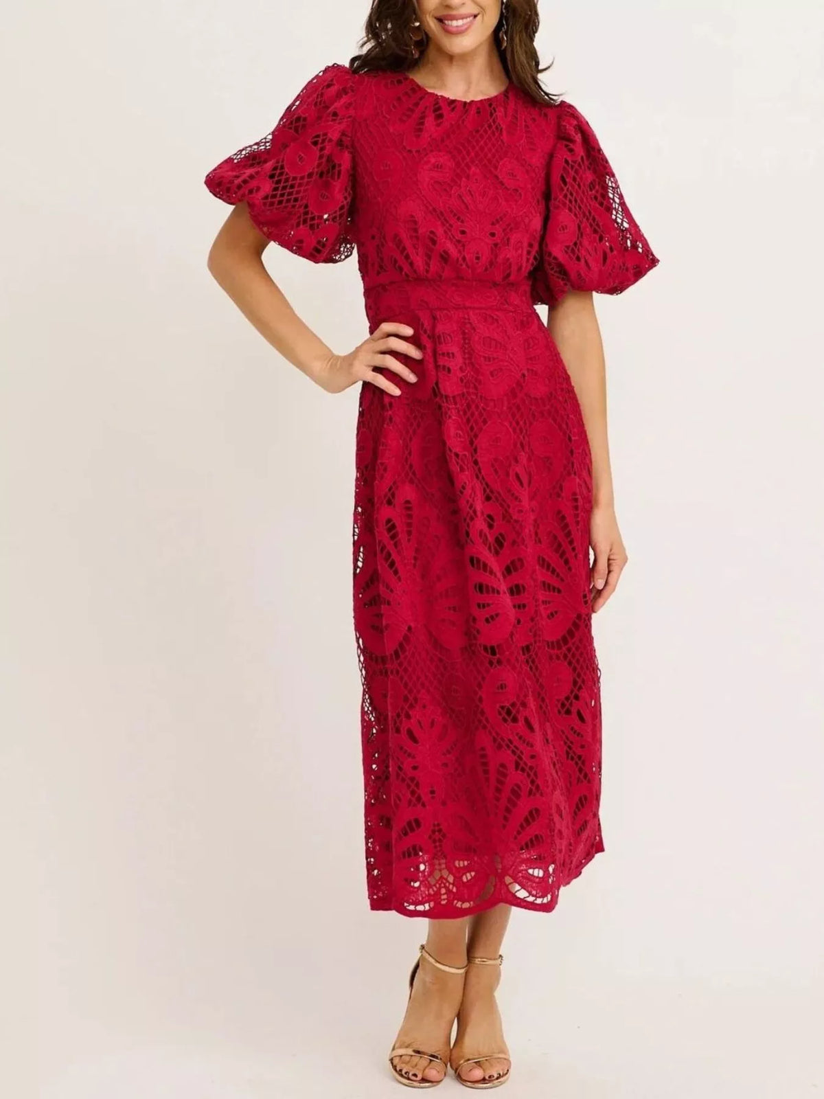 Red lace dress with ruffled sleeves on a white background
