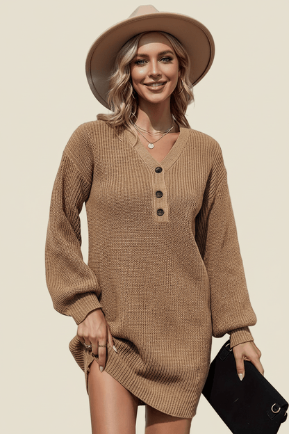 Woman wearing a brown ribbed sweater dress with a beige hat against a beige background