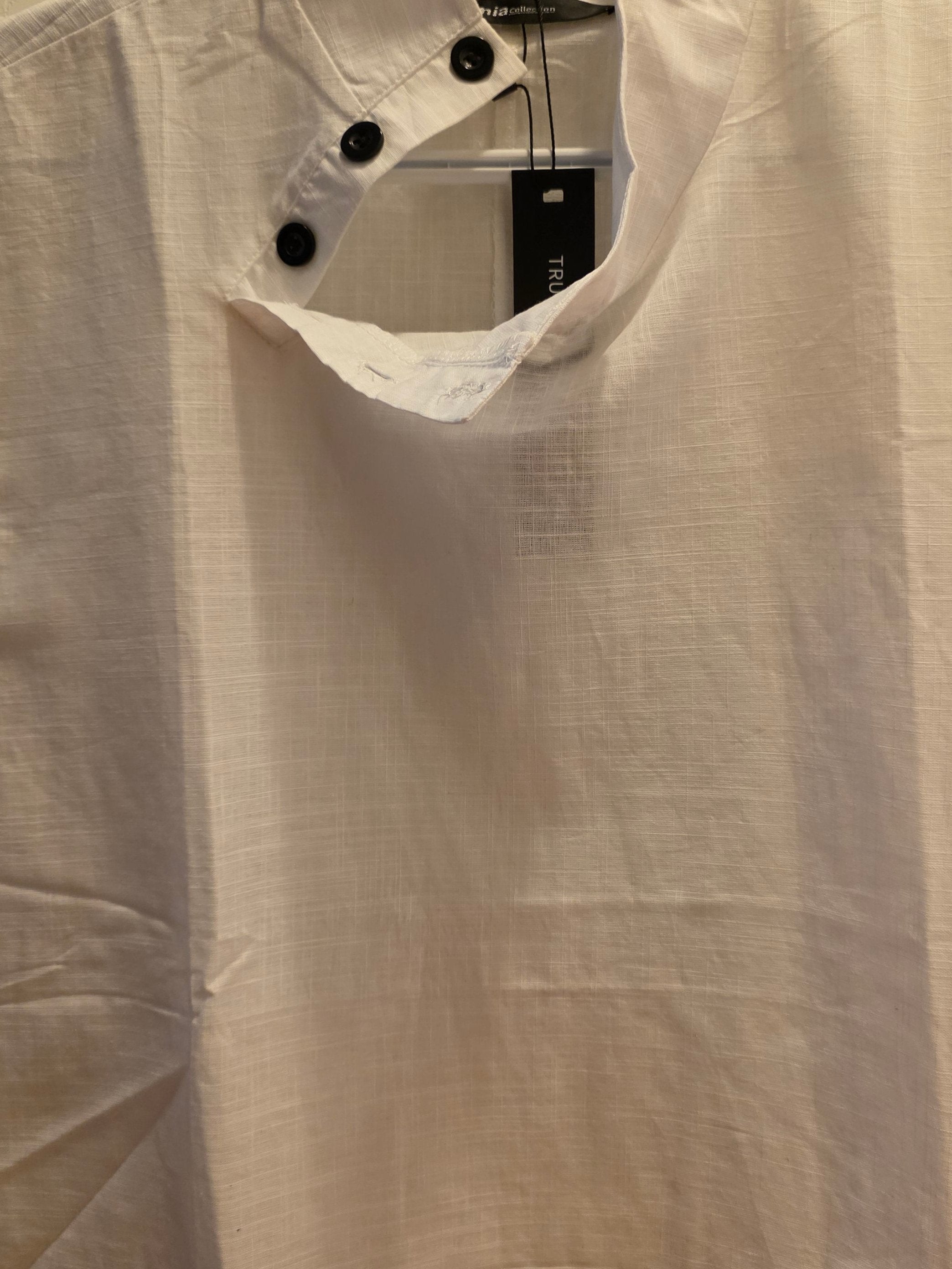 Close-up of a beige shirt with a blurred background