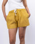 Yellow shorts with white drawstring on a plain background