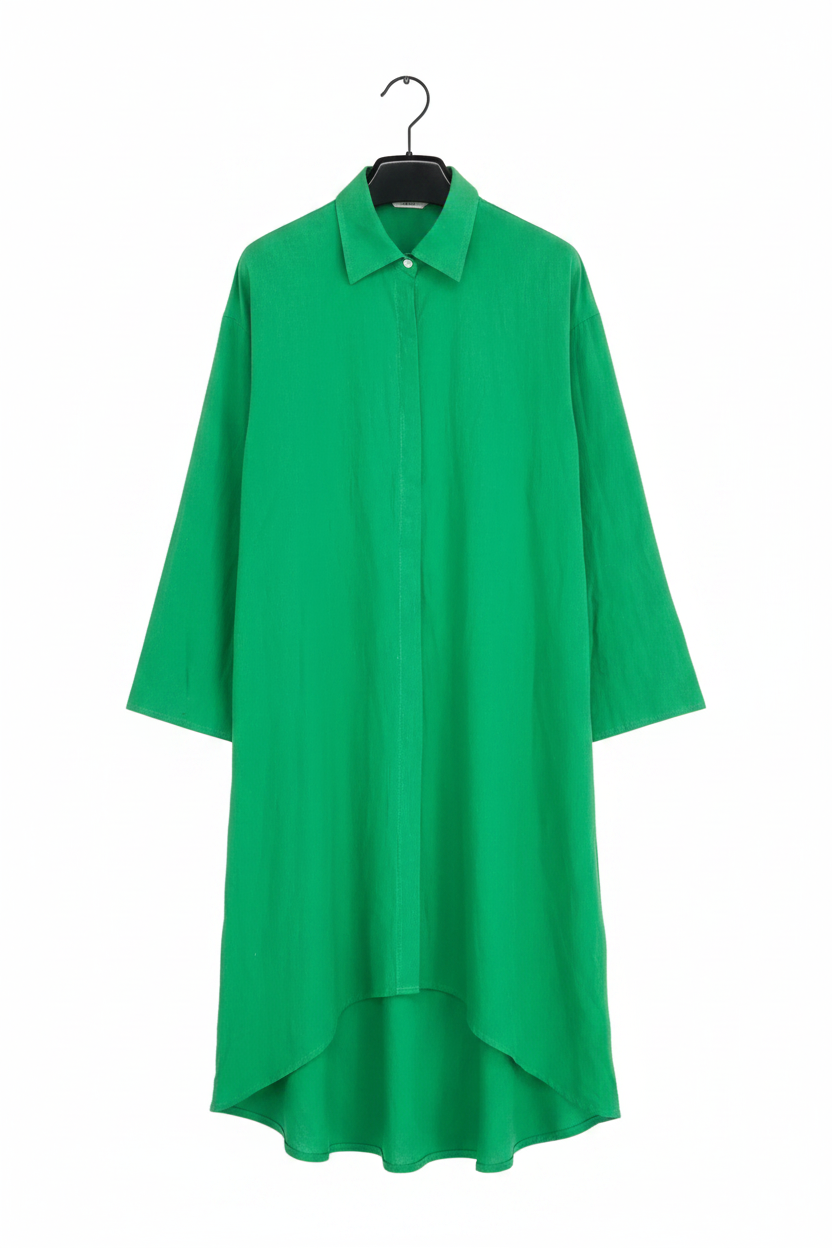 A bright green long-sleeve collared shirt dress with an asymmetrical high-low hem, hanging on a black hanger against a plain white background.