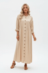 A woman modeling a beige midi-length pleated dress with three-quarter ruffled sleeves and a front button closure, paired with brown sandals, against a plain white studio background.