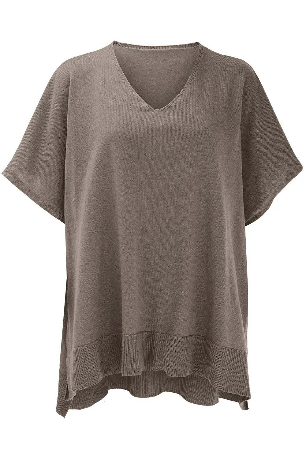 Brown knit poncho on a white background