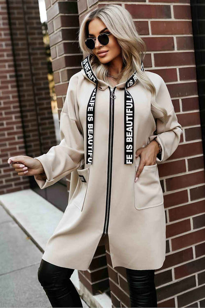 The Arden Cozy Hooded Coat is designed for effortless layering and everyday comfort