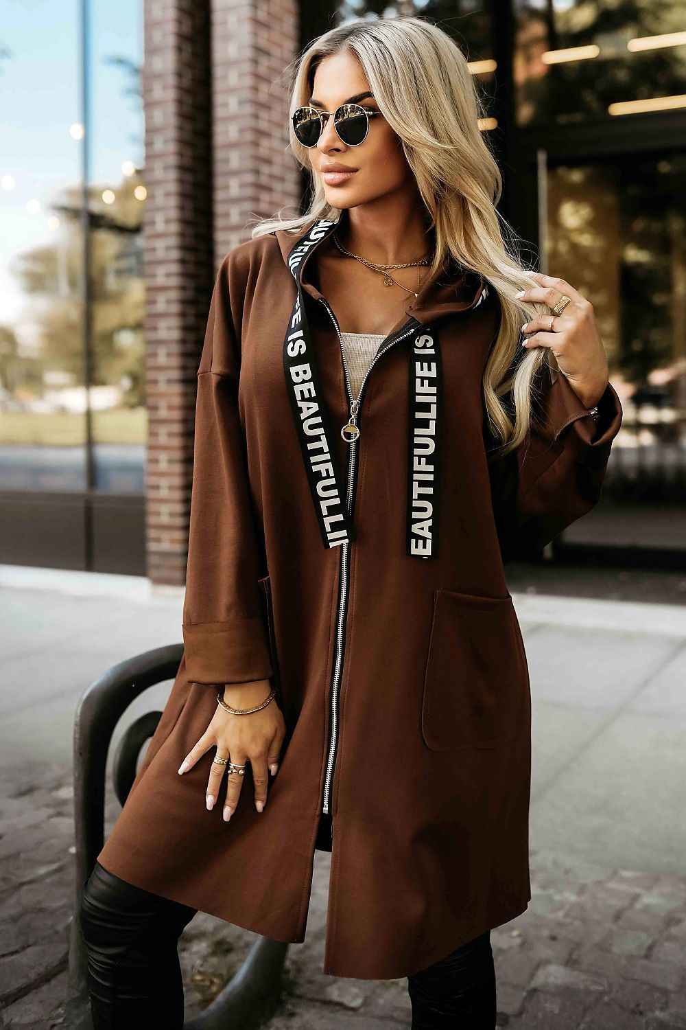 The Arden Cozy Hooded Coat is designed for effortless layering and everyday comfort