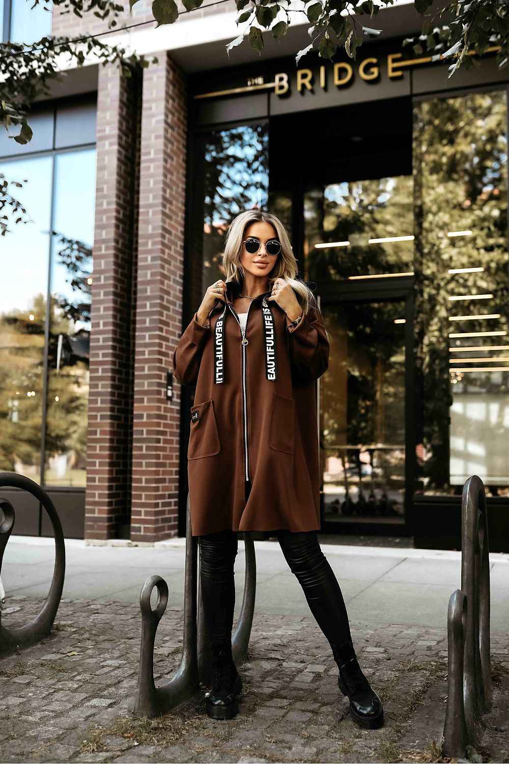 The Arden Cozy Hooded Coat is designed for effortless layering and everyday comfort