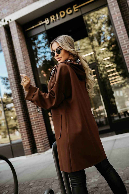 The Arden Cozy Hooded Coat is designed for effortless layering and everyday comfort