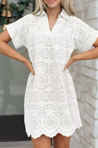 Woman wearing a white lace dress with a blurred background