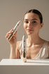Beauty device on a marble surface with a neutral background