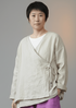 Woman wearing beige ramie v-neck boho blouse